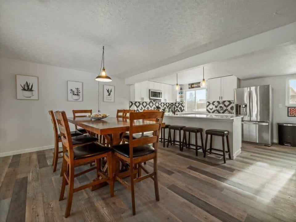 Plenty of room for 12 people to gather around the table and breakfast bar area! Ask us about coffee and other beverage amenities!