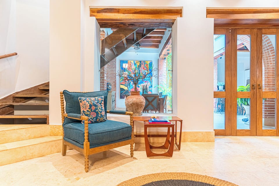 Living room · Reading nook · Colonial brick wall · First floor