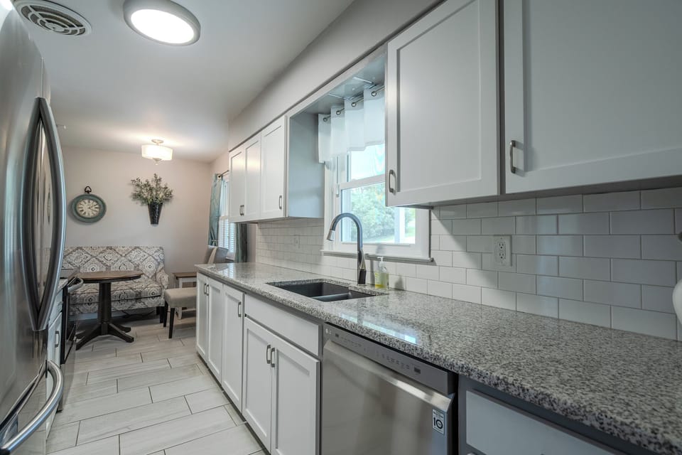 Fully stocked kitchen with Keurig, drip coffee maker, blender, and more.