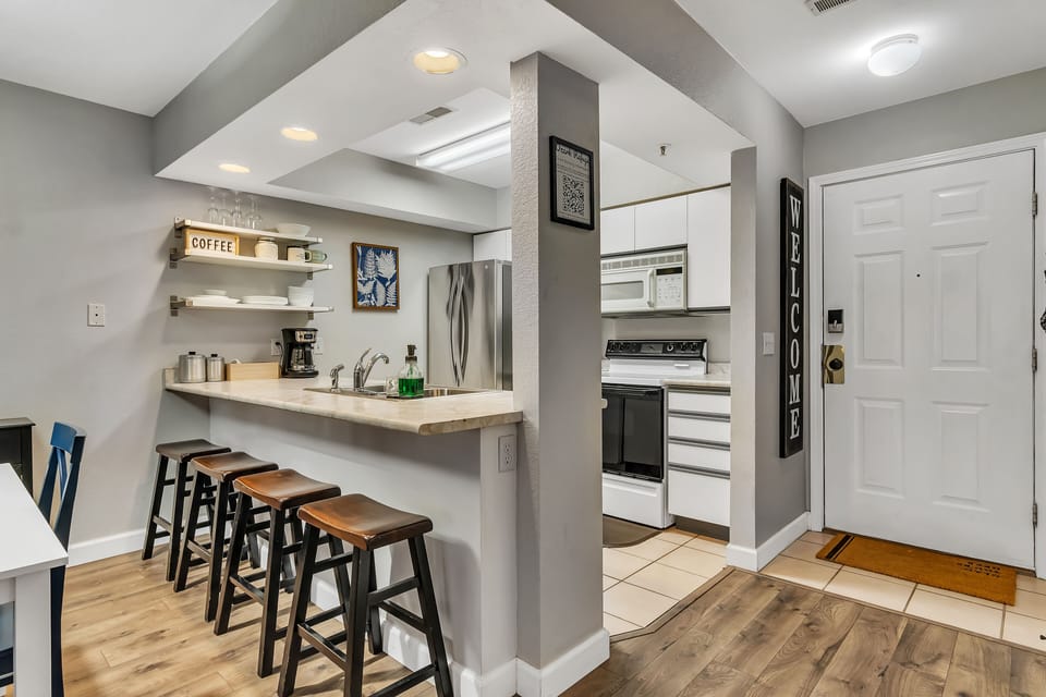 Looking back toward the kitchen and entry way