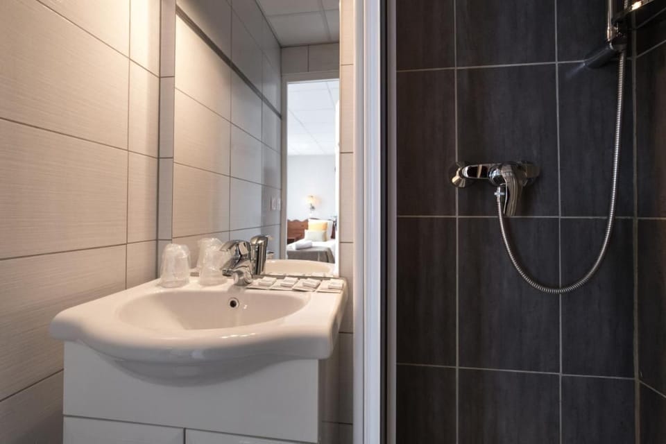 Freshen up for the day in the bathroom.