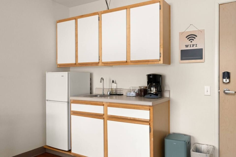 Kitchenette with microwave, mini-fridge, and coffee maker. Perfect for a quick breakfast to enjoy on the patio!