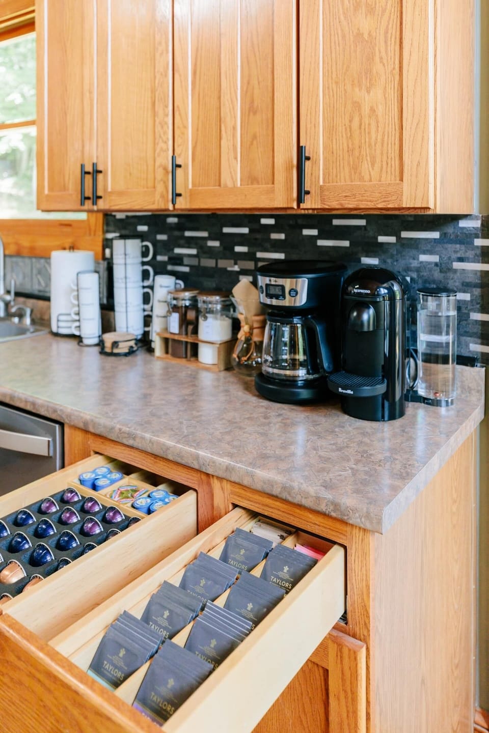 Coffee bar stocked with organic local roasted coffee, Nespresso, organic tea, creamers and sugars. 