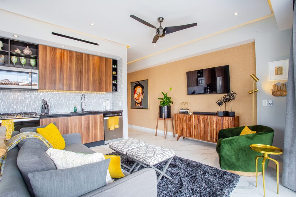 The living room features a 3rd smart TV