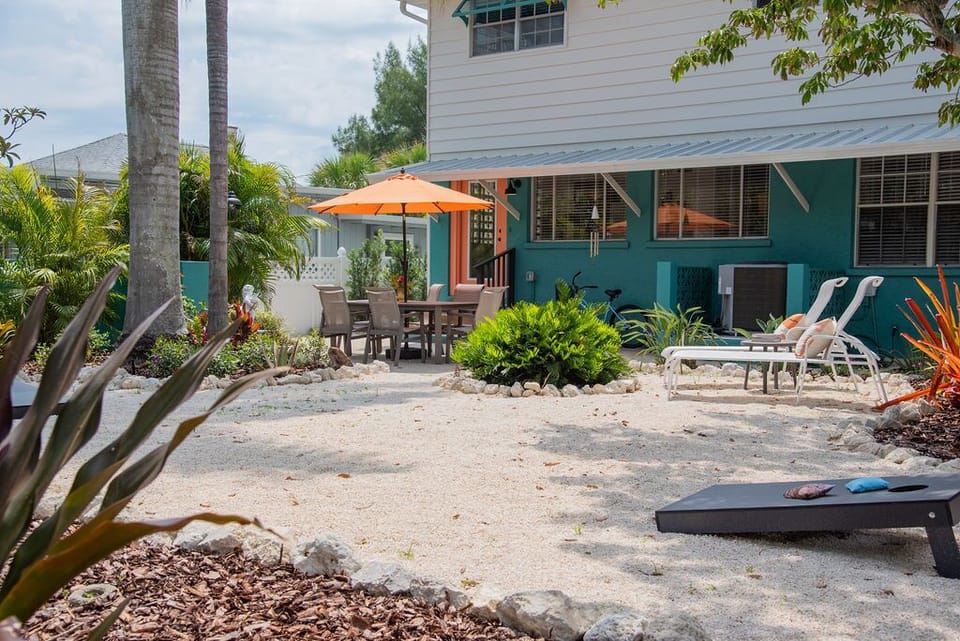 Back Yard  with outdoor dining lounging and games