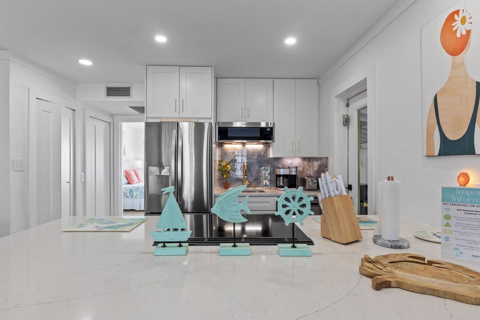 The kitchen which includes a full set up plus a blender, air fryer and more