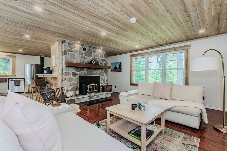 Relax by the fire in the Great room on the plush couches. 