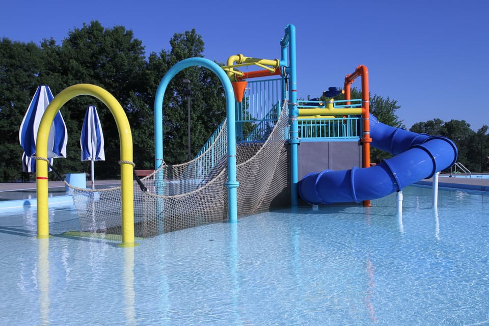 Splash into sunlit fun at the family-friendly water play area.