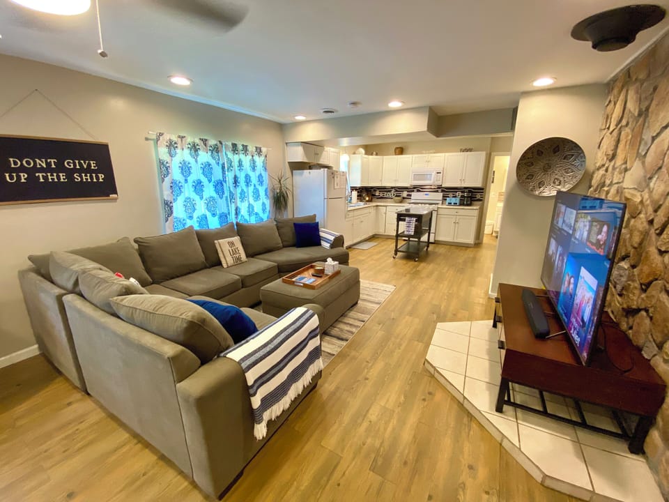 The kitchen, dining, & living room are open concept for max family time.