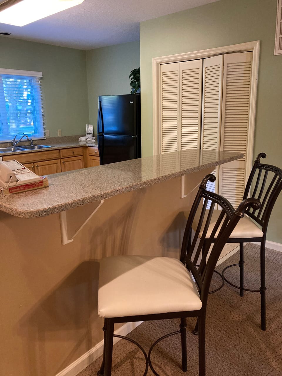 Kitchen with bar counter seating for 2