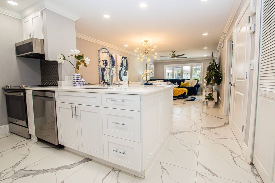 Open floor plan with the dining room and living room with beautiful floors!