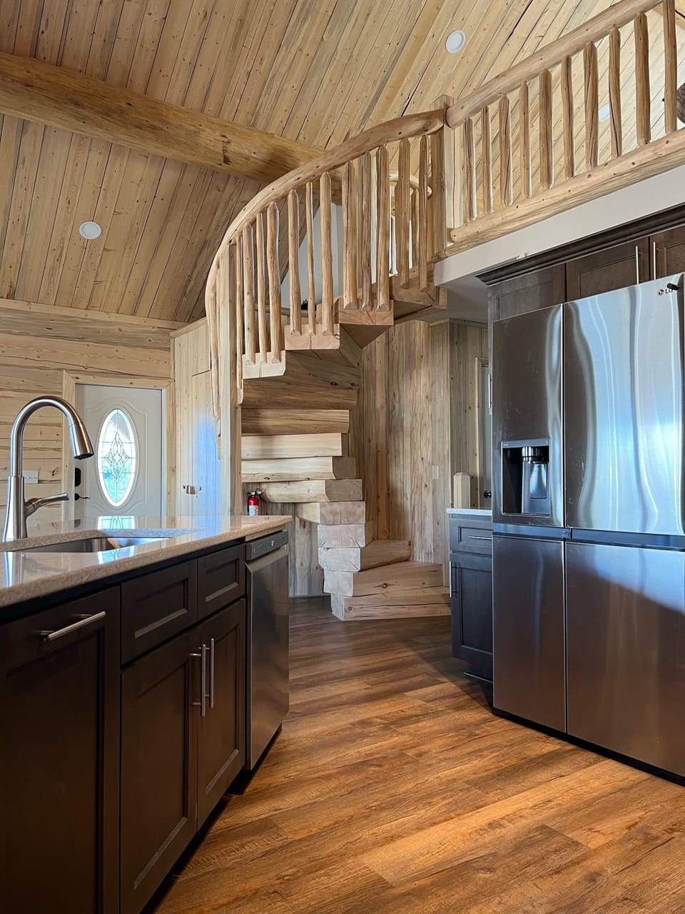 Beautiful spiral staircase leading up to the loft.