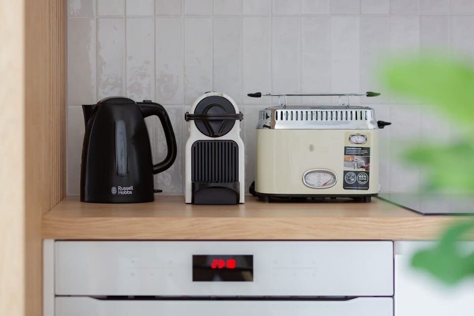 Additional kitchen equipment, coffee machine.