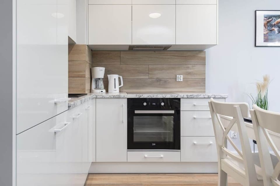 The fully equipped kitchenette includes everything you need for a home-cooked meal.