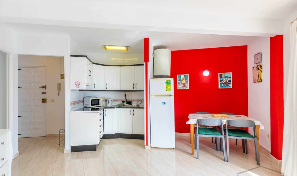 Facade/entrance,Kitchen or kitchenette,Living room,Dining area