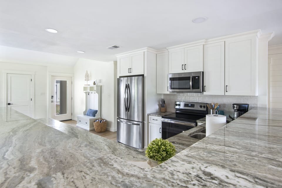 Fully stocked kitchen offers everything you would need during your stay. 