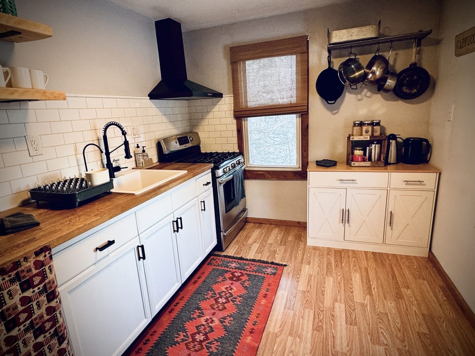 Kitchen is rustic with touch of modern. Kitchen has everything you need to create a great meal. Kitchen was renovated Jan of 2025
