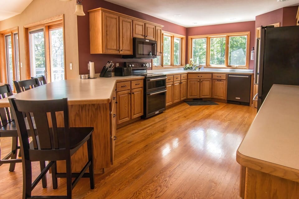 Large kitchen with double stove to cooking for your large group a breeze.