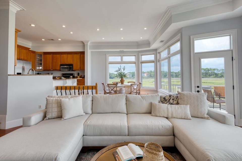 Living area features a large comfortable sectional with room for everyone!