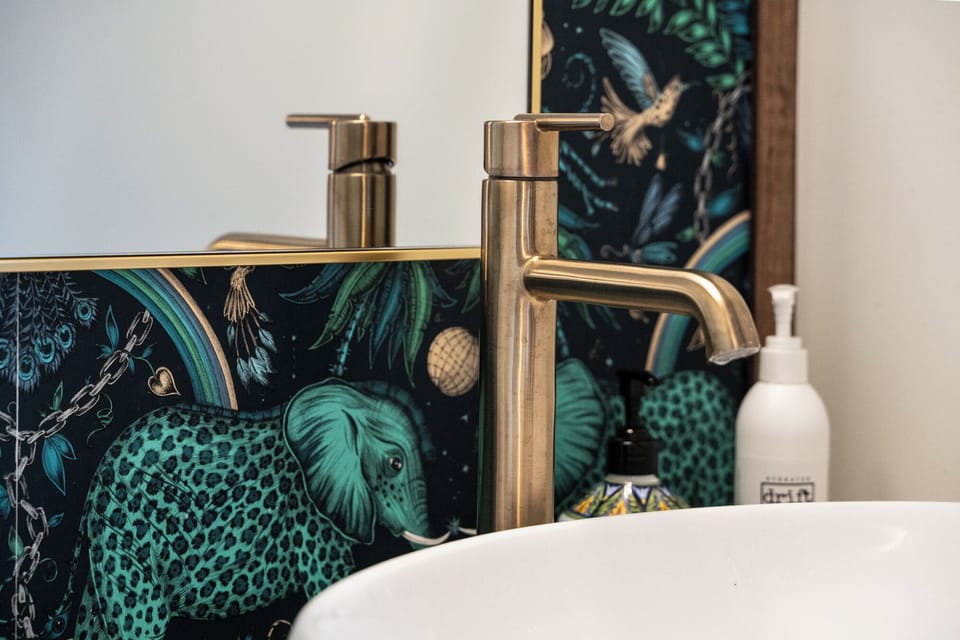 Sleep soundly and prep privately. This spacious king bedroom includes a built-in sink and vanity, offering extra comfort and convenience during your stay.