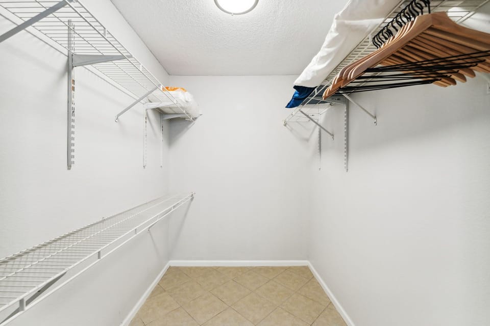 Ample storage in master bedroom walk in closet for short and long term stays