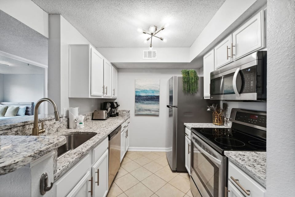 Newly remolded kitchen w/ new appliances, new countertops,  new dishes and pots