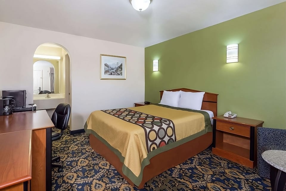 Settle in with a roomy layout and convenient work desk.