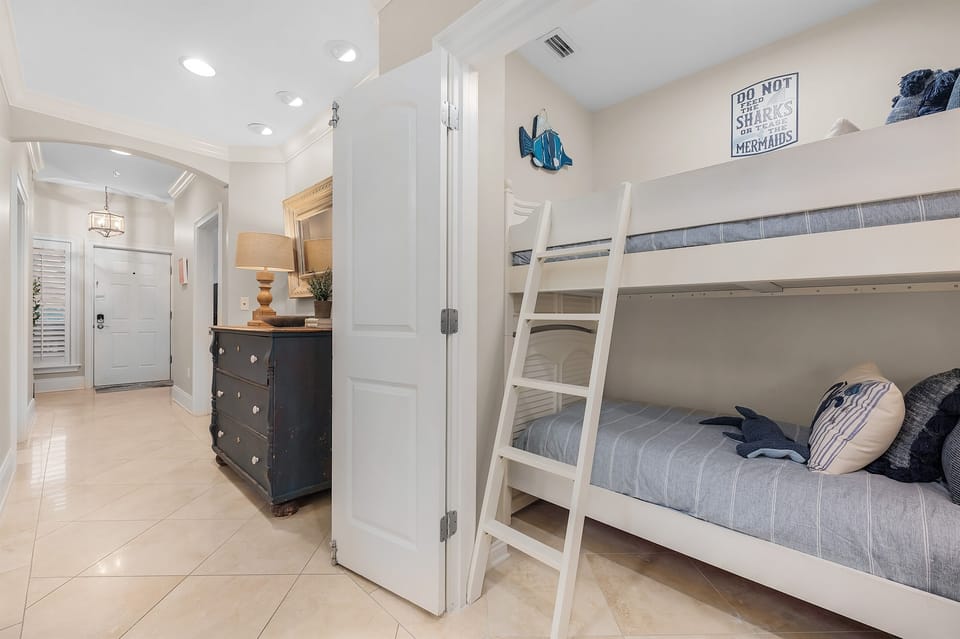 This cozy nook is home to twin bunks