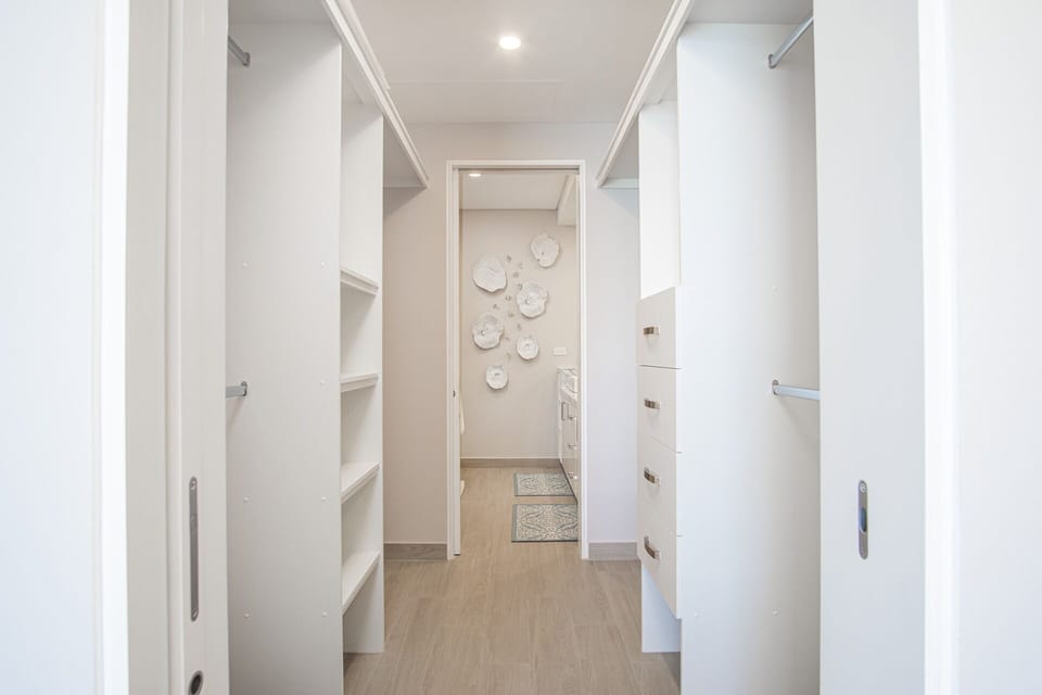 The walk-in closet for the master bedroom.