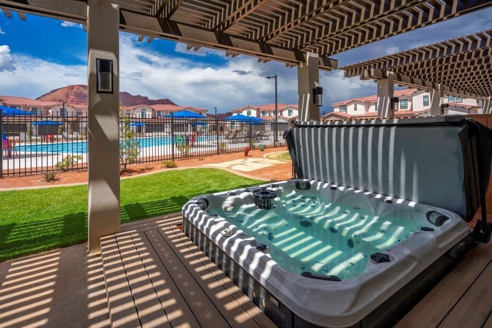 Please note: hot tub is no longer sunken and is at patio level