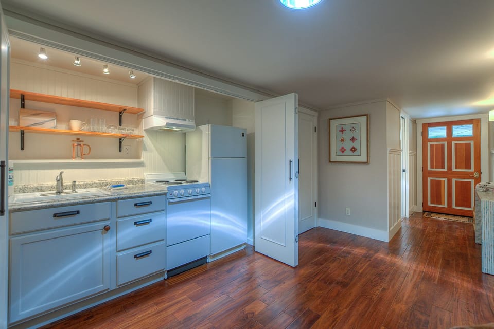 Downstairs has its own kitchenette. Great for morning coffee, or breakfast.