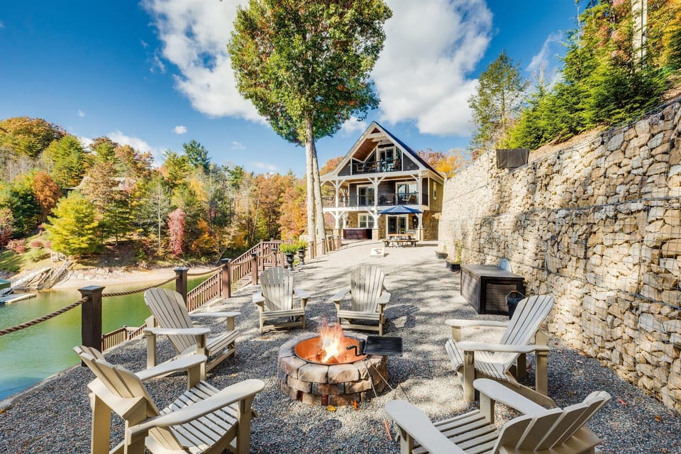 Skipping Stones Getaway Backyard with hot tub, fire pit, wood, roasting forks, corn hole boards, picnic table