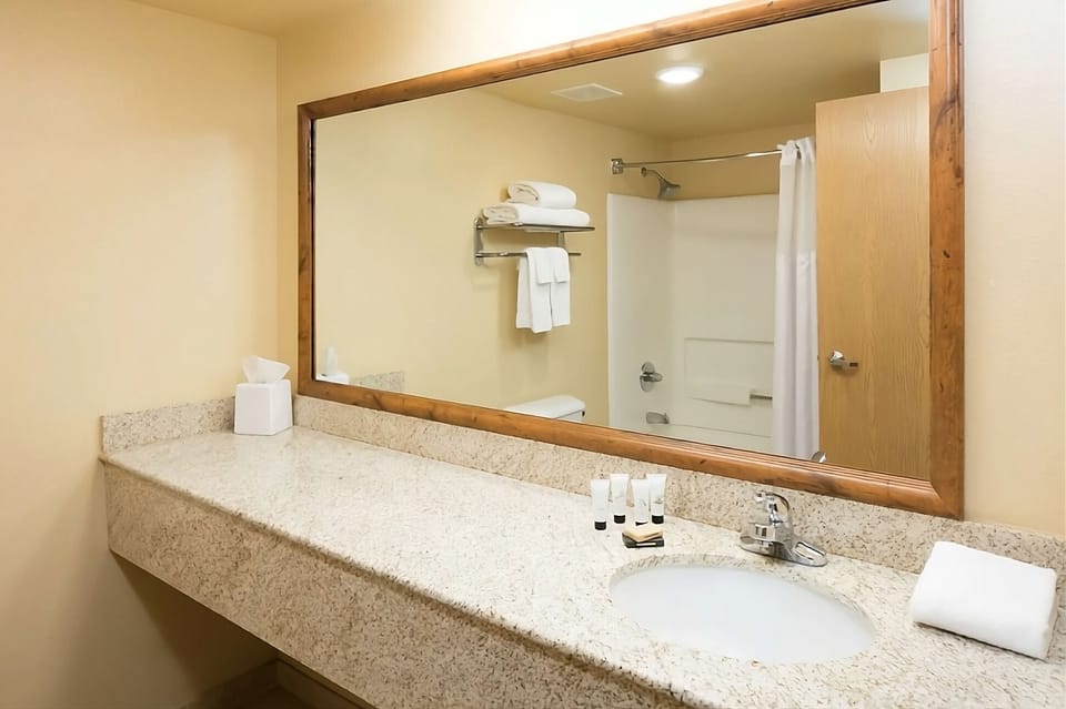 Ease into your routine with bright lighting and ample counter space.