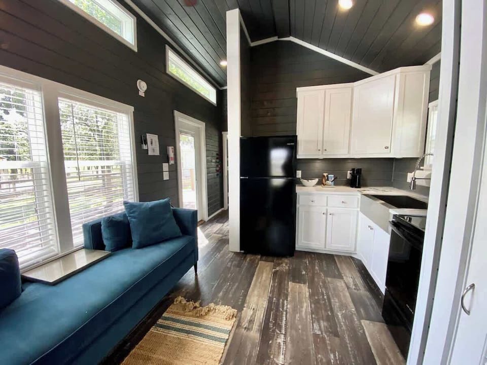 This tiny home is full of charm and has everything you need to have a memorable stay.
