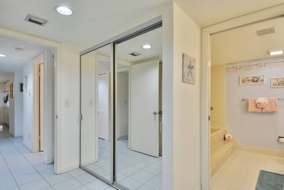 Closet and ensuite bathroom.