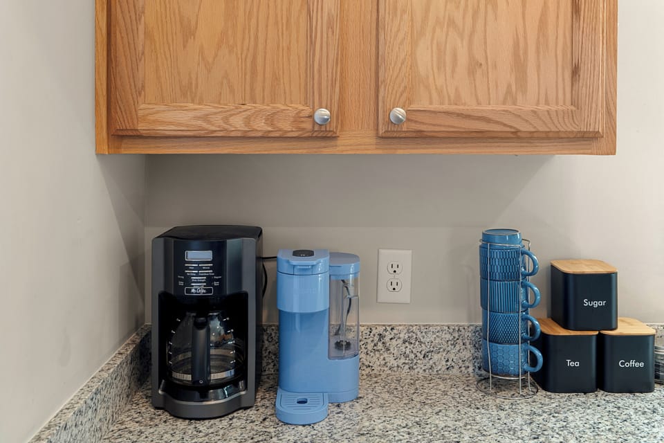 Kitchen with stainless appliances, granite counters, and everything needed for easy meals at home.