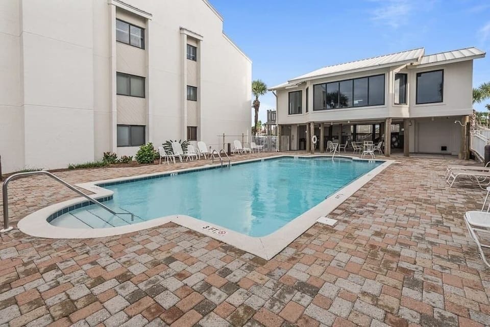Pool #1 on the oceanside with clubhouse.  There is a shaded area to hang out in to beat the sun.  