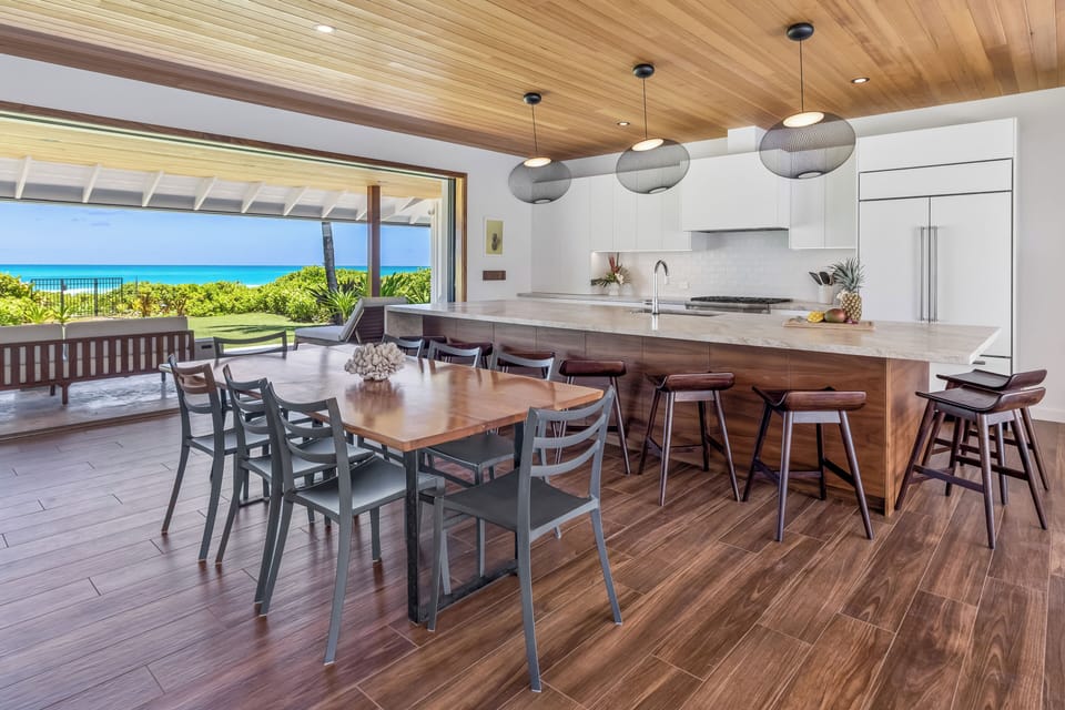 Breakfast bar seating in the open, modern kitchen.