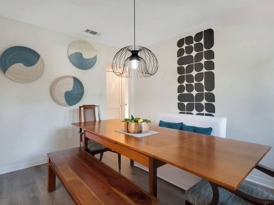 Dining table comfortably seats 6 guests.