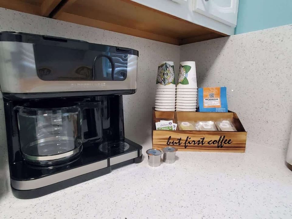 Coffee Station, fully loaded with to go cups, sugar, tea, coffee and more!