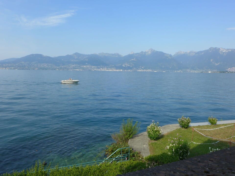 Water, Sky, Cloud, Plant, Mountain, Boat, Azure, Natural Landscape, Highland, Body Of Water
