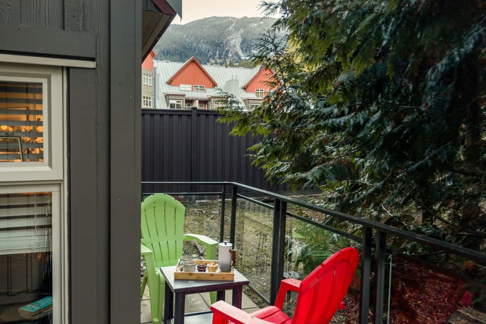 Private patio with seating and peaceful mountain surroundings