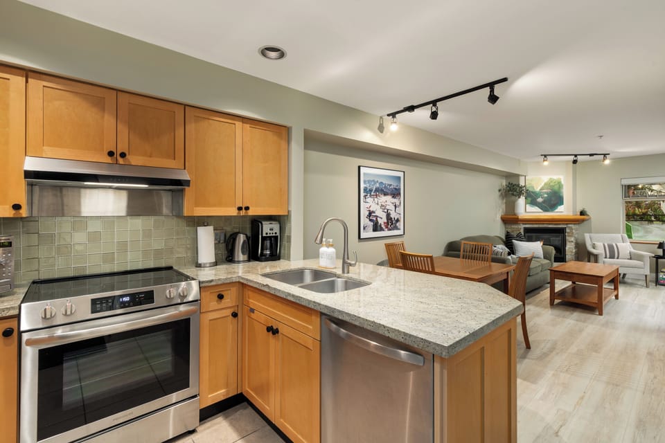 Fully equipped kitchen with granite counters and full-size appliances