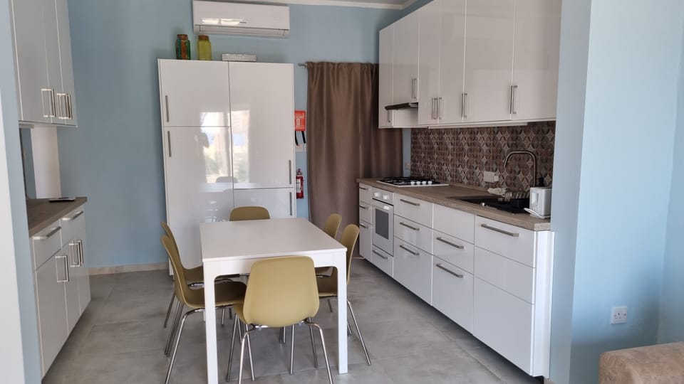 Air-conditioned, well-lit and well-equipped brand new kitchen and dining room