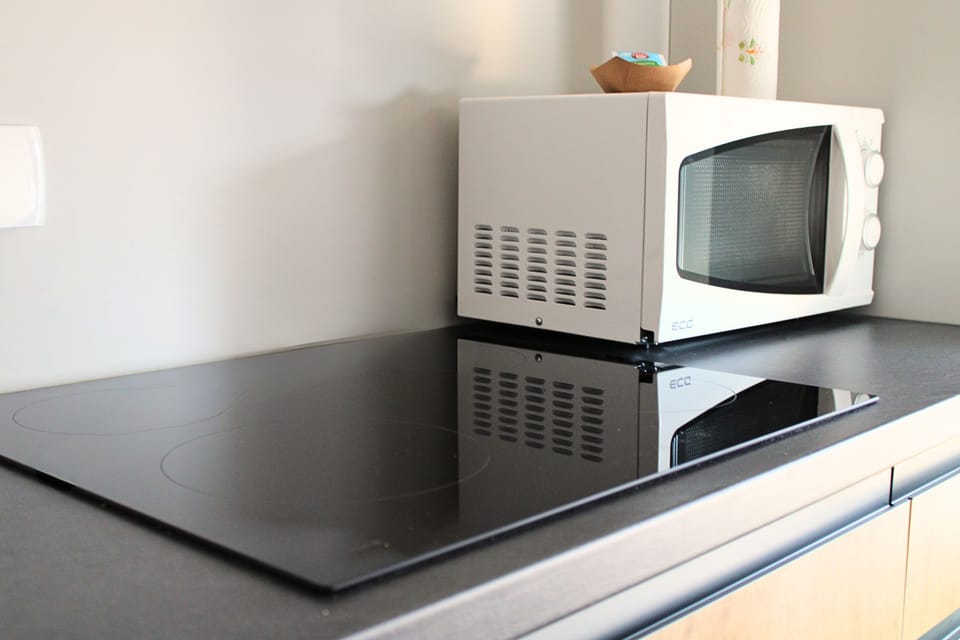 Microwave oven, fringe, induction panel, paper wipes.