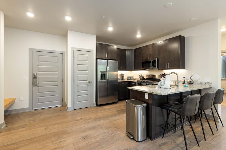 Breakfast bar with seating for three.