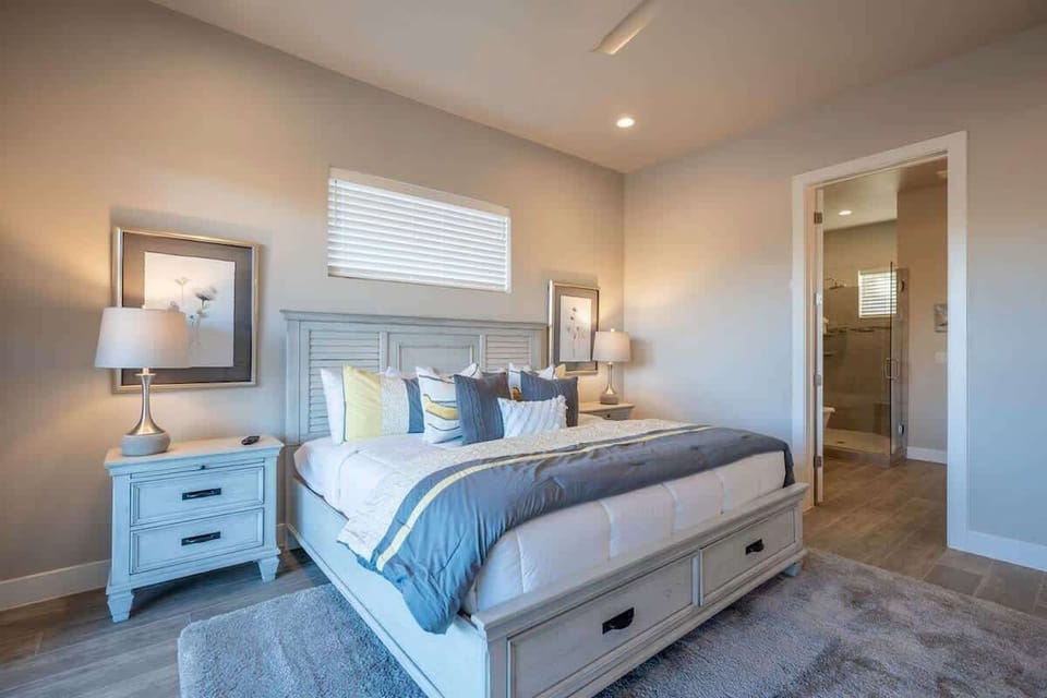 Master bedroom with private bathroom in home #65