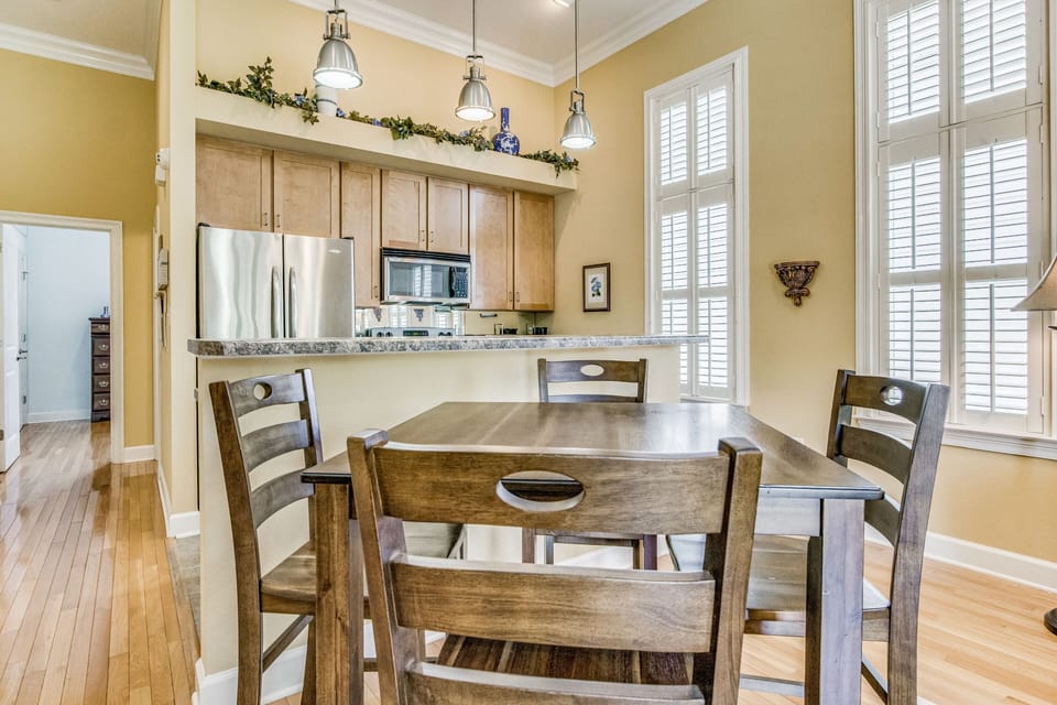 Gather 'round the stylish hightop dining room table, where memories and meals are made to last a lifetime.