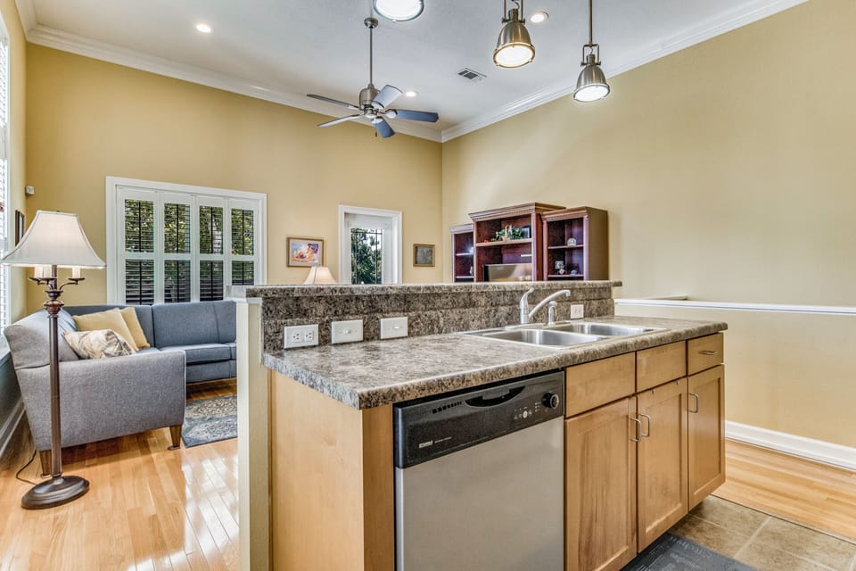 Cook up a culinary storm in the well-equipped kitchen, equipped with an abundance of outlets to power your favorite kitchen gadgets.