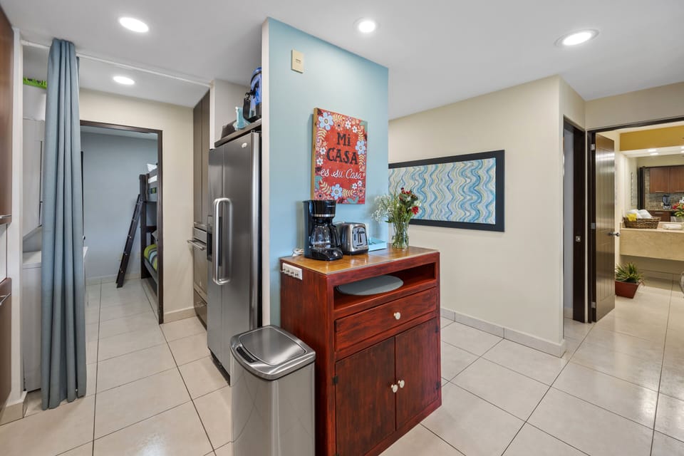 Side by side refrigerator with ice & water in the door...and new full size W&D!